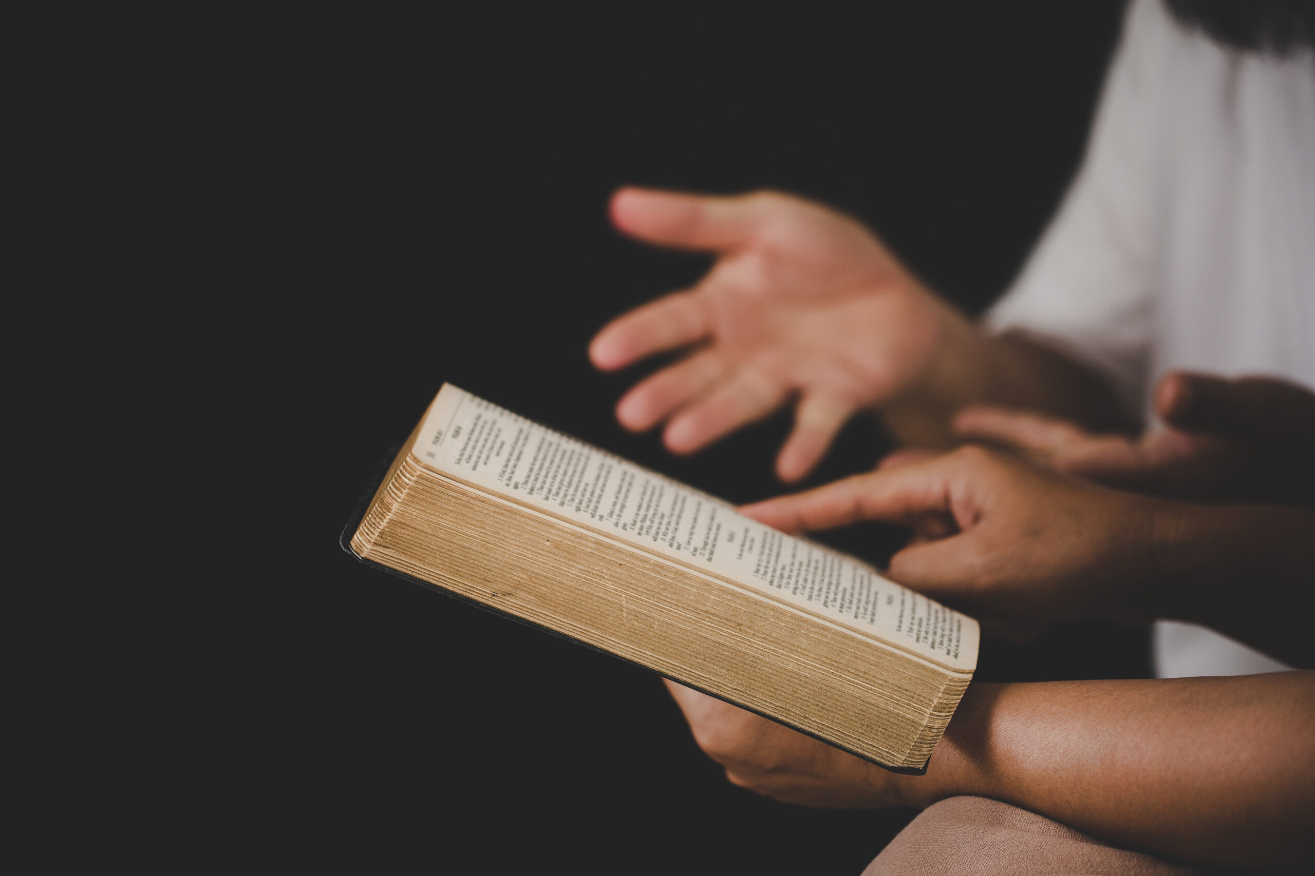 A student reading and studying Scripture